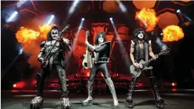  ?? June in Birmingham. Photograph: Keith Leroux ?? ‘I have no idea what I did to deserve any of this’: Gene Simmons (left) plays with Kiss in