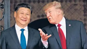  ?? AFP ?? In this photo taken on April 06, 2017, US President Donald Trump (R) welcomes Chinese President Xi Jinping (L) to the Mar-a-lago estate in West Palm Beach, Florida.