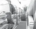  ??  ?? Passengers board a Delta Airlines flight. TIM LOEHRKE/USA TODAY