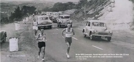  ?? In Your Stride. ?? IN the 1952 Comrades, Gerald Walsh (left) and Trevor Allen (No 17) lead the way up Fields Hill, which was under extensive constructi­on.
|