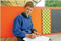  ?? PAULA HULBURT/STUFF ?? Matthew Hall,10, has had a story chosen to be published in a special book highlighti­ng the work of young Kiwi authors.