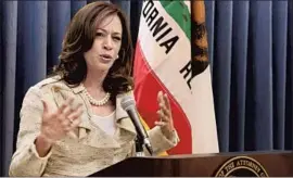  ?? Damian Dovarganes Associated Press ?? KAMALA HARRIS, shown while attorney general of California, will be a loyal supporter of President- elect Joe Biden’s policies, biographer Dan Morain says.