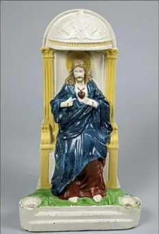  ?? Jeffrey Warhola ?? A Jesus statue painted by a young Andy Warhol between 1938 and 1941.