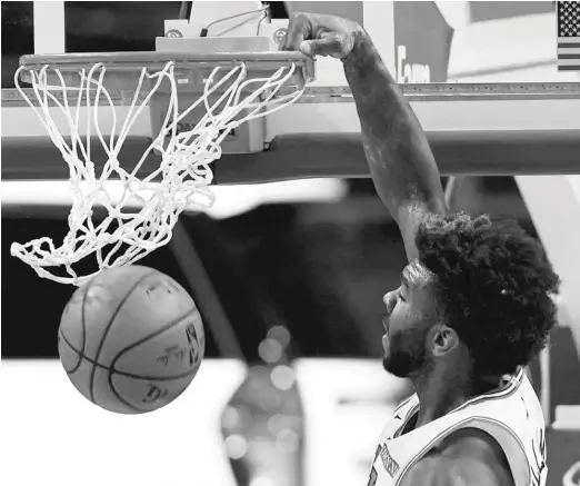  ?? CARLOS OSORIO/AP ?? Bulls rookie forward Patrick Williams, who had 10 points, dunks during the first half Sunday night against the Pistons.