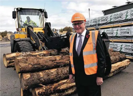  ??  ?? TIMBER: Fergus Ewing at BSW Timber, Boat of Garten, where he announced government funds to plant nearly 3,000 acres of woodland