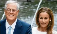  ?? Archivfoto: Christian Horsten, dpa ?? David Koch mit seiner Frau Julia.