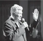  ??  ?? DAVID LYNCH makes a brief appearance to thank the artists and audience at the end of a benefit show.