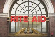  ?? Matt Rourke / Associated Press ?? Drugstore chain Rite Aid and grocer Albertsons say they have called off their merger deal.
