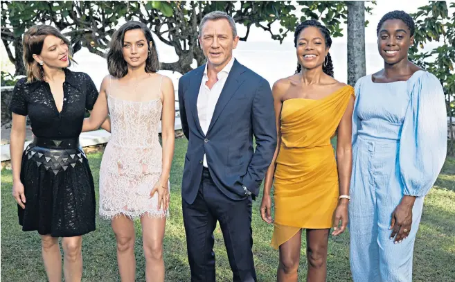  ??  ?? Lea Seydoux, Ana de Armas, Daniel Craig, Naomie Harris and Lashana Lynch arrive at the Goldeneye resort in Jamaica for the announceme­nt of the still-untitled Bond 25 film