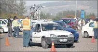  ?? PICTURE: JASON BOUD ?? CHECKING UP: Police and traffic officers check vehicles leaving Cape Town ahead of the Easter weekend on Thursday. The checkpoint was set up on the N1, just before the Hugenot Tunnel.