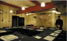  ?? ALASTAIR GRANT — THE ASSOCIATED PRESS ?? The Cabinet room at the Churchill War Rooms in London, Friday. The Map room, Cabinet room and other places that visitors can see at the Churchill War Rooms museum were recreated by set designers for “Darkest Hour,” which tells the story of British...