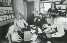  ?? /Ben Martin/Getty Images ?? Family man: Author and former intelligen­ce man David Cornwell unwinds with his family in the kiitchen of their home in St Buryan, Cornwall, in August 1974.