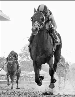  ?? BARBARA D. LIVINGSTON ?? Tapwrit wins the Belmont Stakes for trainer Todd Pletcher, five weeks after stablemate Always Dreaming won the Derby.