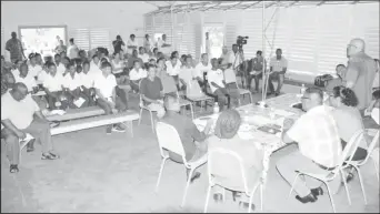  ?? (GINA photo ?? Managing Director of the Guyana Water Incorporat­ed (GWI) Dr. Richard Van West-Charles addressing residents