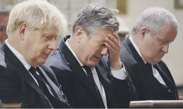  ?? ?? ↑ Boris Johnson, Labour leader Sir Keir Starmer and SNP Wesminster leader Ian Blackford attend a service to honour the late Sir David Amess