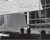  ?? Jeff Chiu / Associated Press ?? Google and Ford Co. are among those again delaying their return-to-office plans.