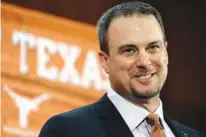  ?? Associated Press ?? n Tom Herman talks to the media Nov. 27, 2016, during a news conference in Austin where he was introduced as Texas' new head NCAA college football coach. After nine months of rebuilding his team, rebuilding state-of-the-art locker rooms and ramping up...