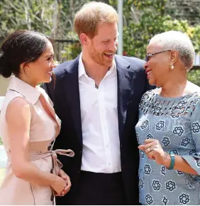  ??  ?? Warm welcome: Duke and Duchess meet Mrs Machel yesterday