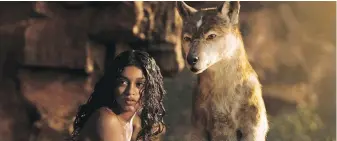  ?? NETFLIX ?? Rohan Chand as Mowgli, left, and Nisha, voiced by Naomie Harris, in Mowgli: Legend of the Jungle.