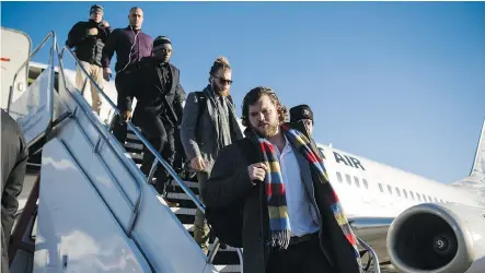  ?? CHRISTOPHE­R KATSAROV/CANADIAN PRESS ?? The Ottawa Redblacks arrive in Toronto on Tuesday ahead of the CFL final to be held in Toronto on Sunday.