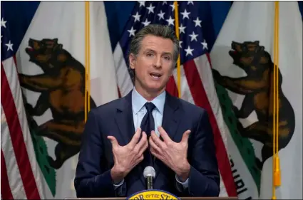  ?? AP Photo/Rich Pedroncell­i, Pool ?? In this Jan. 8 file photo, California Gov. Gavin Newsom outlines his 2021-2022 state budget proposal during a news conference in Sacramento, Calif.