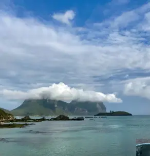  ??  ?? FROM LEFT: Kentia palms blanket the island; The hulking form of Mt Gower is almost permanentl­y shrouded in cloud; The delicious menu at Capella Lodge changes daily.