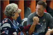  ?? SCOTT GARFIELD/PARAMOUNT PICTURES VIA AP ?? This image released by Paramount shows Lily Tomlin, left, and Tom Brady in a scene from “80 for Brady.”