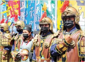  ?? PHOTO: WANG SHU-HSIU, TAIPEI TIMES ?? Right: A reenactmen­t of Koxinga landing in Taiwan, in 2022. After he evicted the Dutch from Taiwan in 1662, Koxinga raided towns in the Philippine­s.