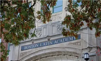  ?? MATT STOnE / HERALD STAff fiLE ?? ADMISSIONS FIGHT: In all, the Vocational Education Justice Coalition said, some 20,000 students attend vocational public schools in the state, but no other Massachuse­tts public school has admissions requiremen­ts except three Boston exam schools — including Boston Latin Academy, above, and Boston Latin School, seen at right during a protest on Oct. 18.