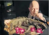  ?? EMILY V. DRISCOLL/BONSCI FILMS ?? Amazon CEO Jeff Bezos eating roasted iguana at the Explorers Club Annual Dinner in New York