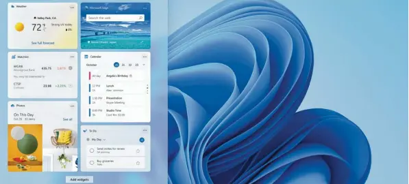  ?? Foto: Microsoft/dpa ?? Wie auf dem Smartphone: Zum Desktop des neuen Windows 11 lassen sich Widgets hinzufügen, also kleine Info‰Fenster.