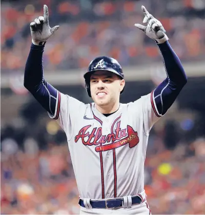  ?? GETTY FILE ?? Longtime Braves star Freddie Freeman finally won a World Series this year but may end up wearing a new uniform next season.