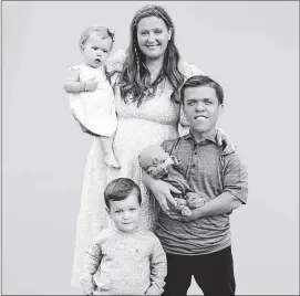  ?? ?? Tori and Zach Roloff with their children in “Little People, Big World”