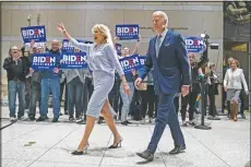  ?? (File Photo/AP/Matt Rourke) ?? Democratic presidenti­al candidate former Vice President Joe Biden, accompanie­d by wife Jill, arrives March 10, 2020, to speak to members of the press at the National Constituti­on Center in Philadelph­ia.