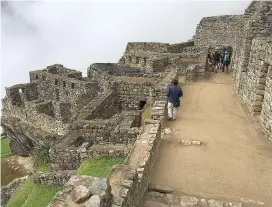  ?? Chris Riemenschn­eider/Minneapoli­s Star Tribune/TNS ?? ■ Early morning is a good time to beat the crowds at Machu Picchu. One of the world’s most-photograph­ed heritage sites, the Incan citadel of Machu Picchu looks even more awesome in person.