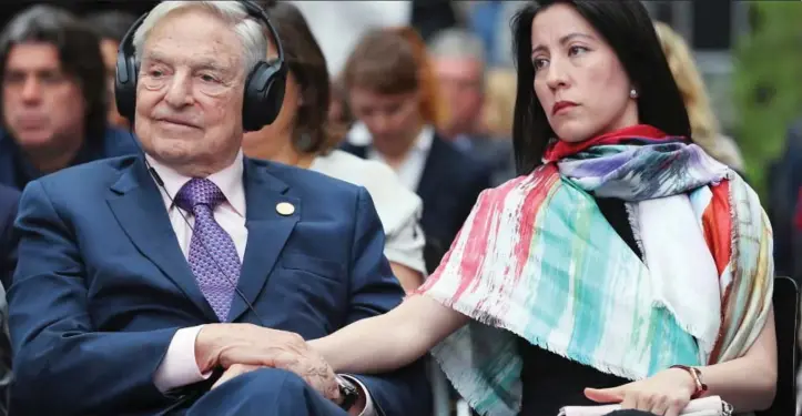  ??  ?? Self-important: George Soros with third wife Tamiko in Berlin last June