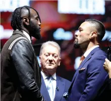  ?? Getty Images ?? Deontay Wilder, left, and Joseph Parker face off at a ‘Day Of Reckoning’ press conference in London last month