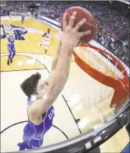  ?? Streeter Lecka / Getty Images ?? Duke’s Grayson Allen dunks against Kansas on Sunday during the NCAA Men’s Basketball Tournament Midwest Regional final.