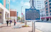  ?? DREAMSTIME/TNS ?? A sign marks Rosa Parks’ bus stop in downtown Montgomery, Alabama.