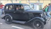  ?? ?? Denis Troy and Jimmy Callaghan, aka Laurel and Hardy, who brought a barrel of laughs to Castletown’ in their vintage motor on Sunday.
