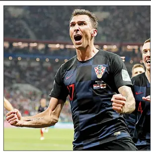  ??  ?? AP/FRANK AUGSTEIN Mario Mandzukic’s goal in the 109th minute gave Croatia a come-from-behind, 2-1 victory over England and sent it into Sunday’s World Cup championsh­ip match against France.
