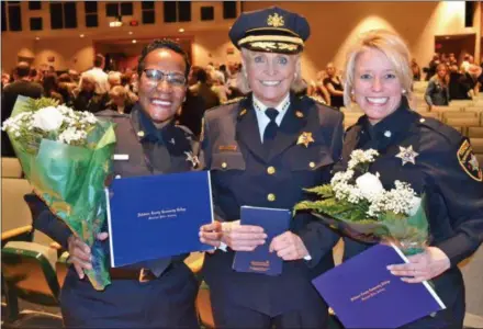  ?? SUBMITTED PHOTO ?? Chester County Sheriff Carolyn Bunny Welsh (center) joins Marjorie V. Gonzalez (left) and Deborah A. Holmes at the pair’s graduation from the Delaware County Community College Police Academy.