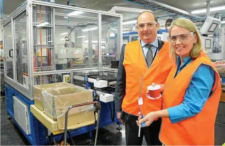  ?? Photo: Tom Gillespie ?? PUSH START: Industry Minister Kate Jones yesterday launched the new electronic blasting system assembly line by Orica’s factory in Helidon, represente­d by Australia and Asia-Pacific president Darryl Cuzzubbo.