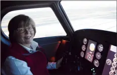  ?? NEWS PHOTO EMMA BENNETT ?? Terri Super at Super T Aviation demonstrat­es the flight simulator on Friday. Pilots from the U.K. could soon be coming to Medicine Hat to train.