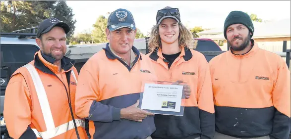  ??  ?? TEAM EFFORT: From left, Tim Broadbear, Justin Lane, Corey Morgan and Damiano Boddi with Lane Building Contractor­s’ Master Builders North West Regional Building Award. Picture: PAUL CARRACHER