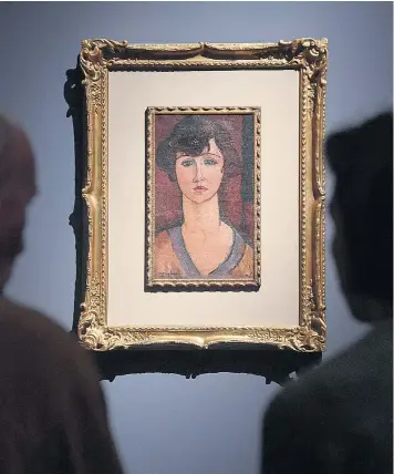  ??  ?? One of the reportedly fake Modigliani paintings – Ritratto di Donna (Élisabeth Fuss-amoré) – on display in the Palazzo Ducale, Genoa