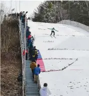  ?? Lara Green-Kazlauskas / For Hearst Connecticu­t Media ?? Satre Hill in Salisbury held its annual Jumpfest ski event Feb. 4-5, attracting competitor­s and plenty of residents to cheer them on.