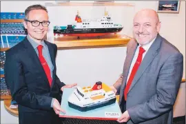  ??  ?? Robbie Drummond and Martin Dorchester pictured in 2016 after winning the contract to operate ferry services on the west coast of Scotland.