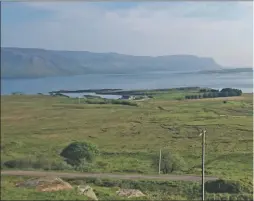  ??  ?? The view from the plot where the new houses will be located takes in the islands of Ulva and Inch Kenneth, all within the Loch na Keal National Scenic Area.