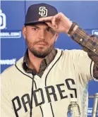  ?? JOHN SLEEZER/AP ?? Eric Hosmer and the San Diego Padres finalized their $144 million, eight-year contract Monday.